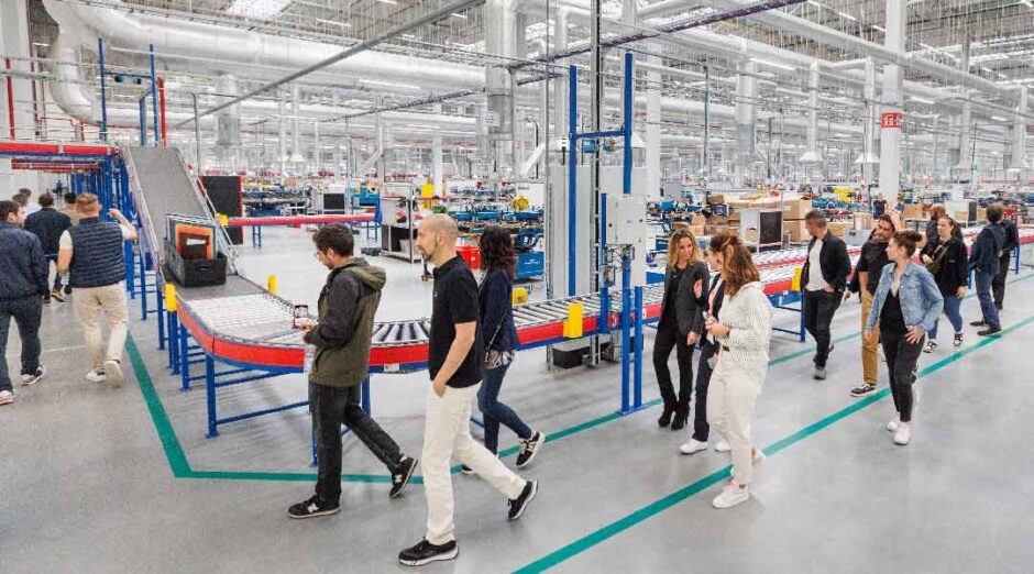 Employees visiting a factory