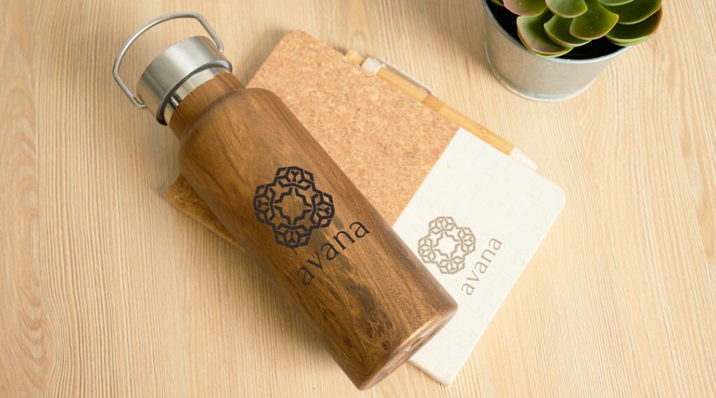 Wooden bottle and cork notebook with logo