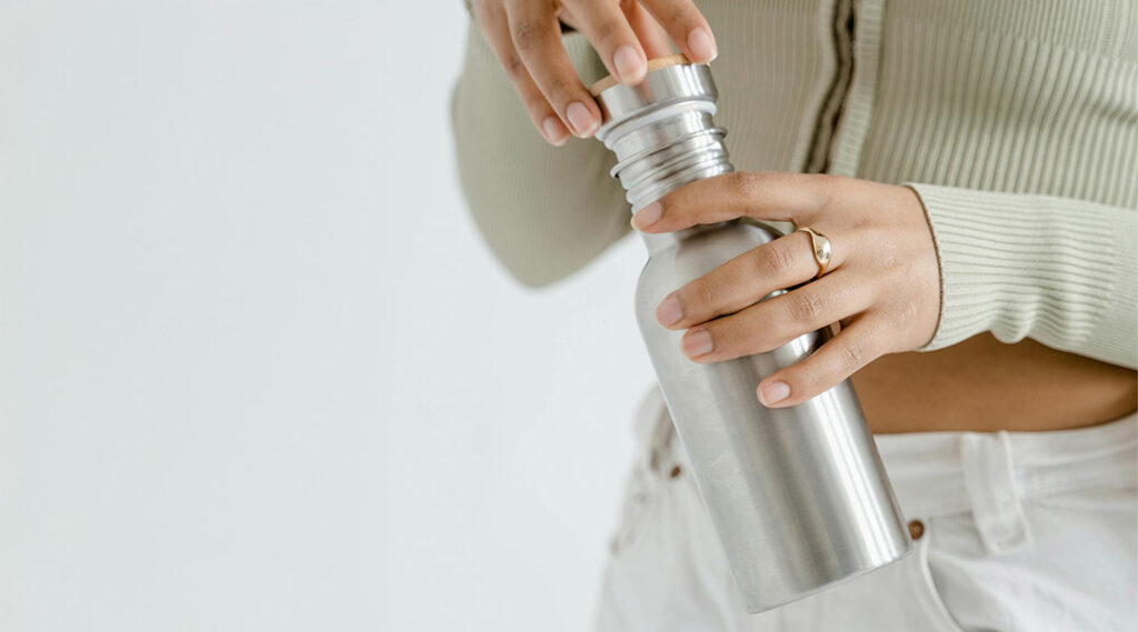 Woman with thermos in hand 