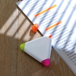 Fluorescent triangle highlighters with colourful corners white colour ambient view