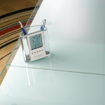 Pencil holder with time, alarm, calendar and temperature display transparent colour ambient view