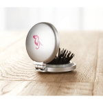 Small round mirror with hairbrush as a practical beauty gift silver colour second ambient view 2