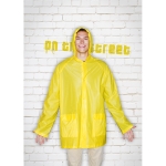 PVC raincoat with hood and press studs yellow colour ambient view