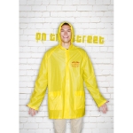 PVC raincoat with hood and press studs yellow colour main ambient view