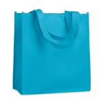 Affordable non-woven bag with short handles, 80 g/m2 turquoise colour