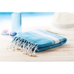 Beach towel made of cotton in different colours turquoise colour ambient view