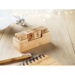 Desk calendar with wooden blocks for dates wood colour ambient view