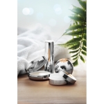 Lip balm stick in metallic container, SPF 15 UV shiny silver colour main ambient view