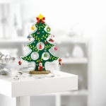 Small decorative Christmas tree with 12 pendants for xmas green colour ambient view