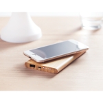 Wireless bamboo power bank as a sustainable gift, 6,000 mAh wood colour ambient view