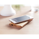 Wireless bamboo power bank as a sustainable gift, 6,000 mAh wood colour main ambient view