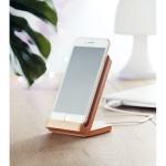 Wireless smartphone charger and bamboo stand wood colour ambient view