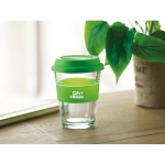 Glass takeaway cup with lid and silicone band, 350 ml lime colour main ambient view