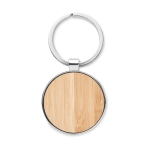 Round keyring made of zinc and bamboo wood colour third view