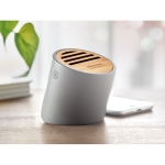 Bluetooth speaker made of limestone cement and bamboo grey colour main ambient view