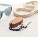 Floating cork keyring, oval-shaped royal blue colour ambient view