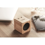 Wireless cube-shaped speaker with bamboo housing wood colour second ambient view 2