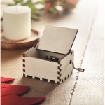 Christmas music box with the song Merry Christmas wood colour ambient view