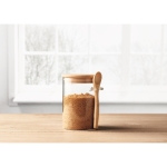 Mason jar with bamboo lid and sugar spoon transparent colour ambient view