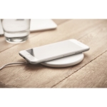 White wireless charger for smartphones white colour ambient view