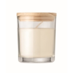 Vanilla scented candle in a glass for gifting transparent colour third view