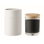 Vanilla-scented wax candle in a jar with bamboo lid black colour