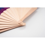 Wooden fan made of polyester with rainbow pride flag multicolour colour photographic view