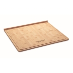 Large bamboo chopping board with juice groove wood colour main view