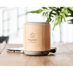 Speaker with bamboo housing and carrying loop for hanging wood colour third main view