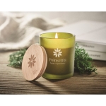 Candle in a glass jar with bamboo lid, in 4 different scents green colour main ambient view