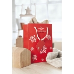 Medium red gift bag with a white snowflake motif red colour second ambient view 2