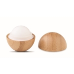 Round natural lip balm in bamboo container, SPF 10 wood colour