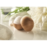 Round natural lip balm in bamboo container, SPF 10 wood colour main ambient view