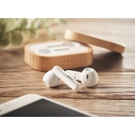 2 Bluetooth earphones TWS 5.0, 3hrs playback, bamboo case wood colour main ambient view