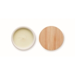 Vegetable wax candle with linen scent, bamboo lid, cork base white colour fourth view