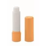 Vegan vanilla lip balm, SPF 10, in recycled ABS case orange colour