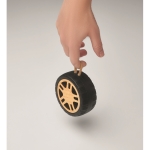 Wireless speaker in the shape of a tyre with a hand strap wood colour fifth photographic view