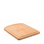 Bread shaped bamboo chopping board with a groove on the edge view with print area