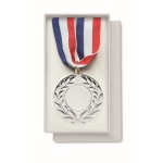 Medal made of iron in the 3 colors blue, white, and red matt silver colour