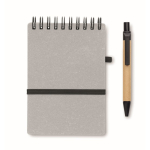 Notebook with blue ink pen and elastic band, lined pages grey colour fourth view