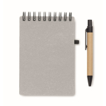 Notebook with blue ink pen and elastic band, lined pages grey colour fifth view