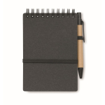 Notebook with blue ink pen and elastic band, lined pages dark grey colour