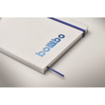 Notebook with elastic band and coloured bookmark, lined A5 pages blue colour photographic view