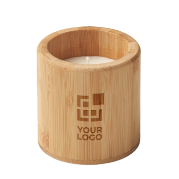 Vanilla-scented candle in a bamboo holder for health salons