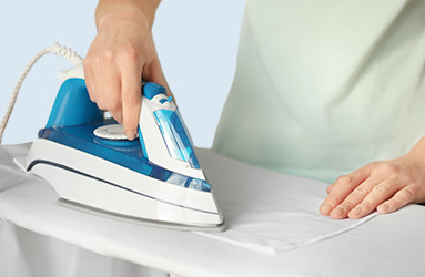 Ironing an apron